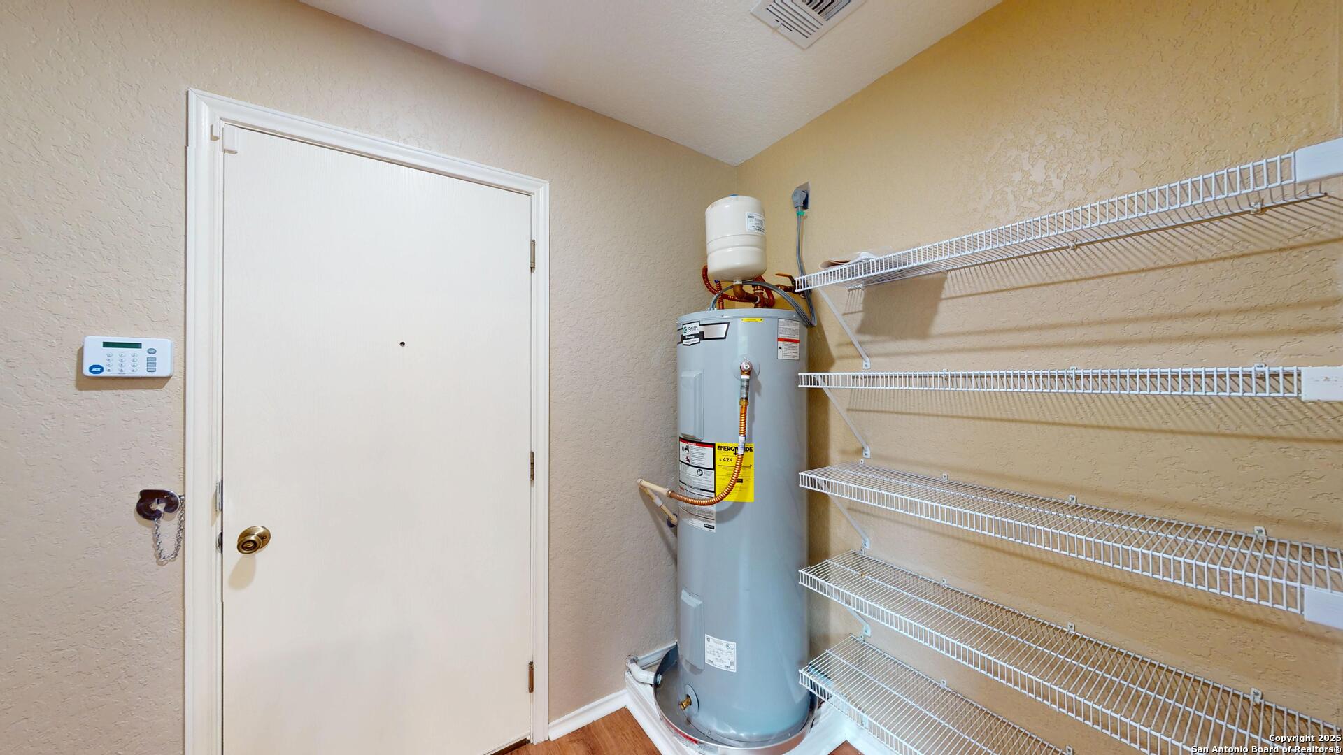 117 Foxglove Pass Cibolo, TX 78108 - Photo 17 of 46 a view of hallway with wooden floor