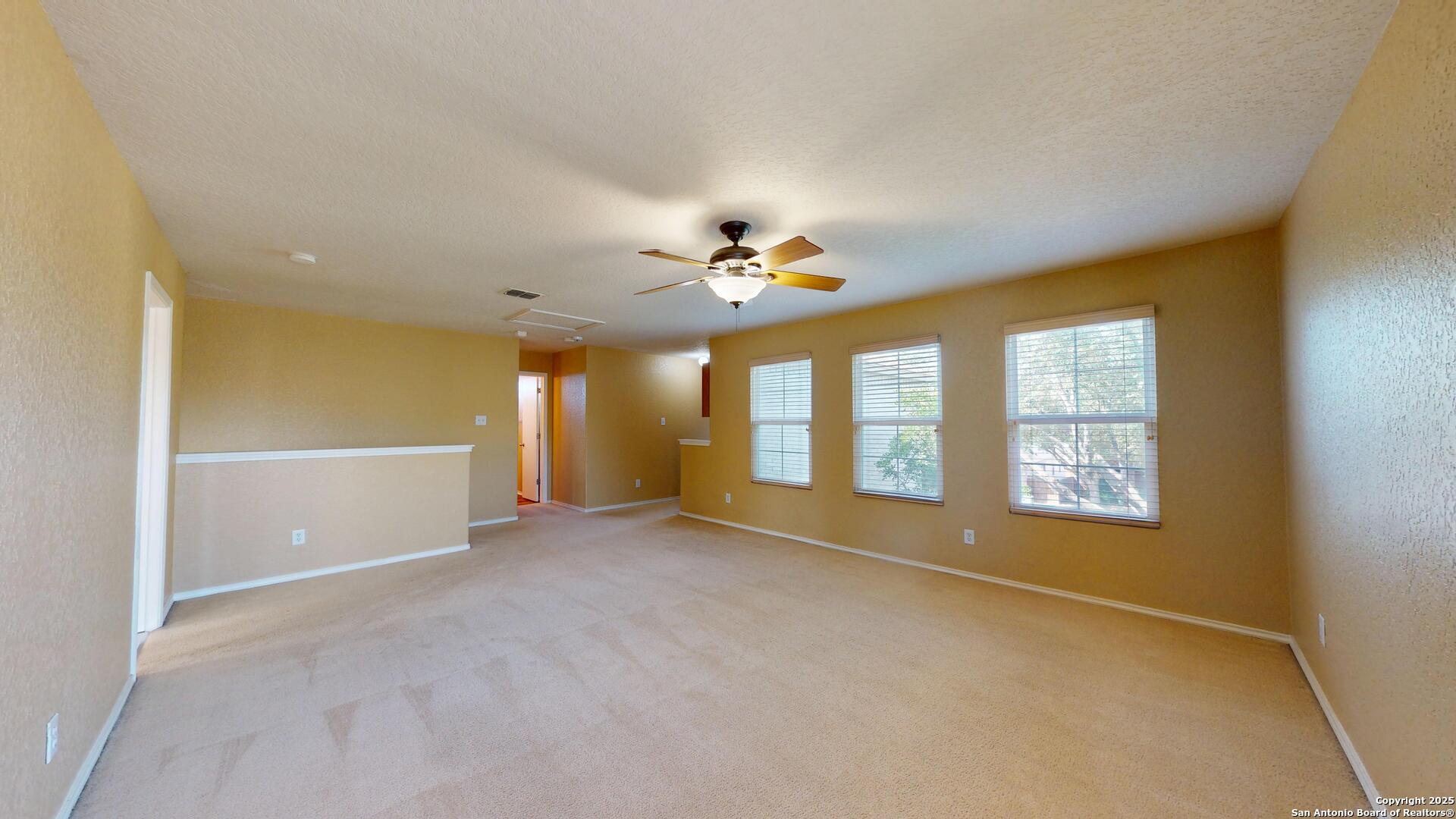 117 Foxglove Pass Cibolo, TX 78108 - Photo 21 of 46 a view of an empty room with a window