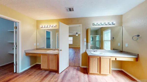 a view of living room kitchen and entryway