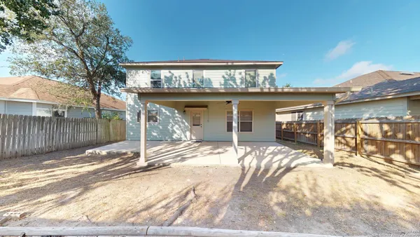 a view of a house with a patio