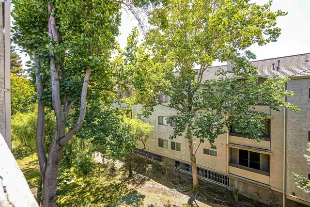 a view of swimming pool with outdoor seating and yard