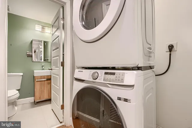 a utility room with dryer and washer