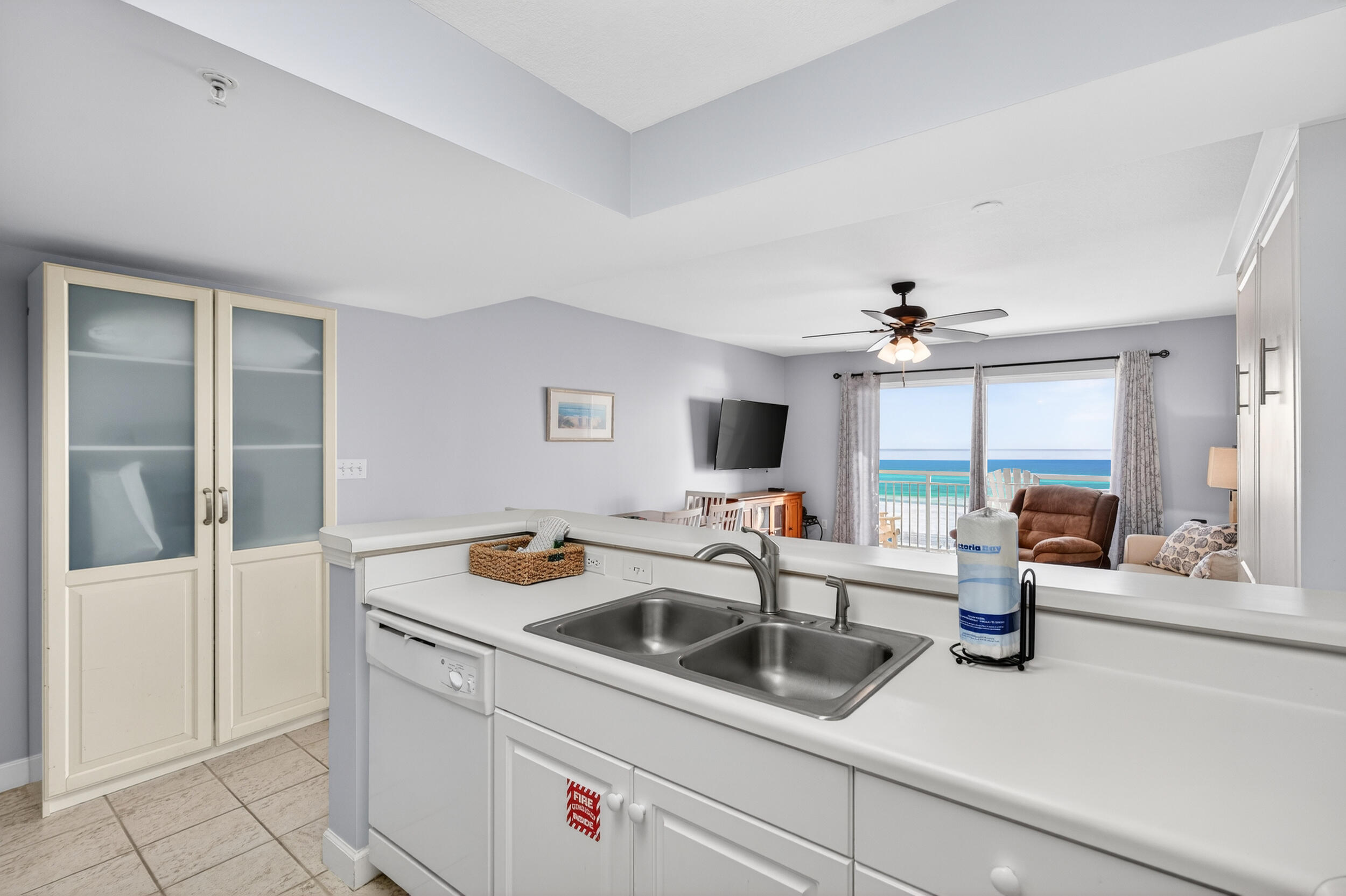 866 Santa Rosa Boulevard, Unit 317 Fort Walton Beach, FL 32548 - Photo 14 of 46 a kitchen that has a sink and cabinets
