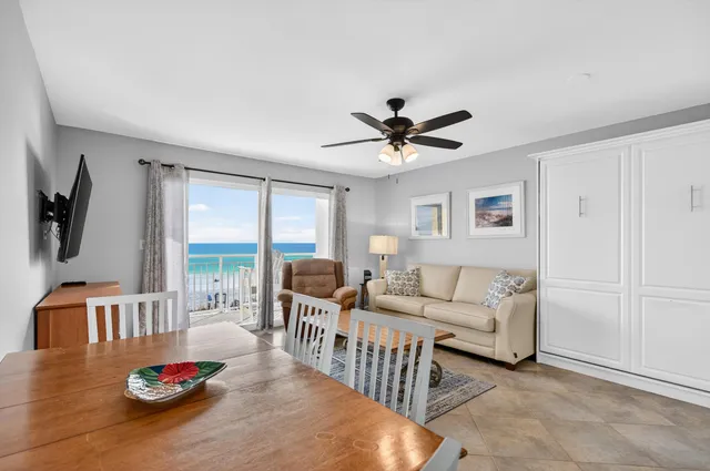 a living room with furniture fireplace and a flat screen tv