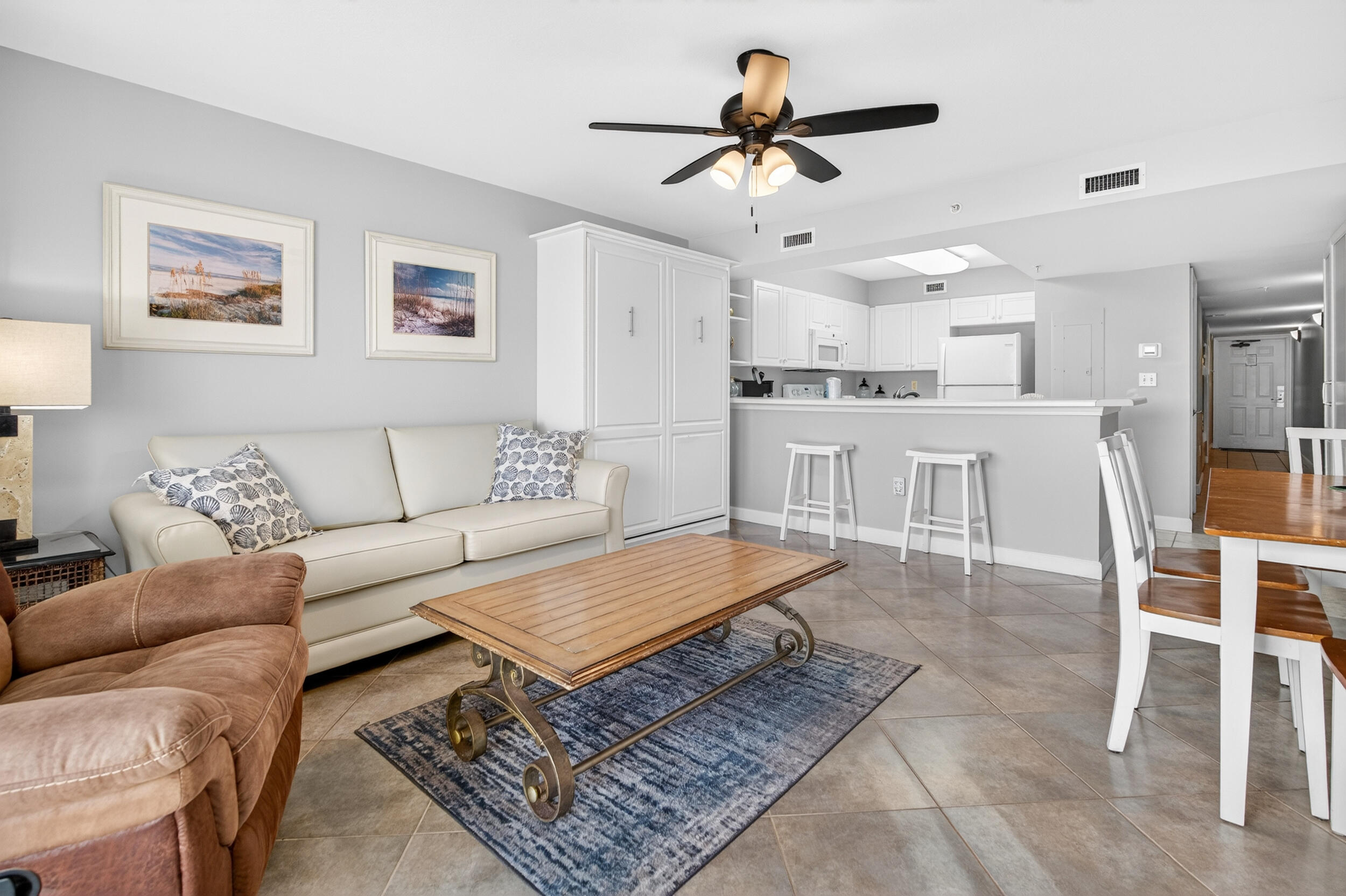 866 Santa Rosa Boulevard, Unit 317 Fort Walton Beach, FL 32548 - Photo 23 of 46 a living room with furniture and kitchen view
