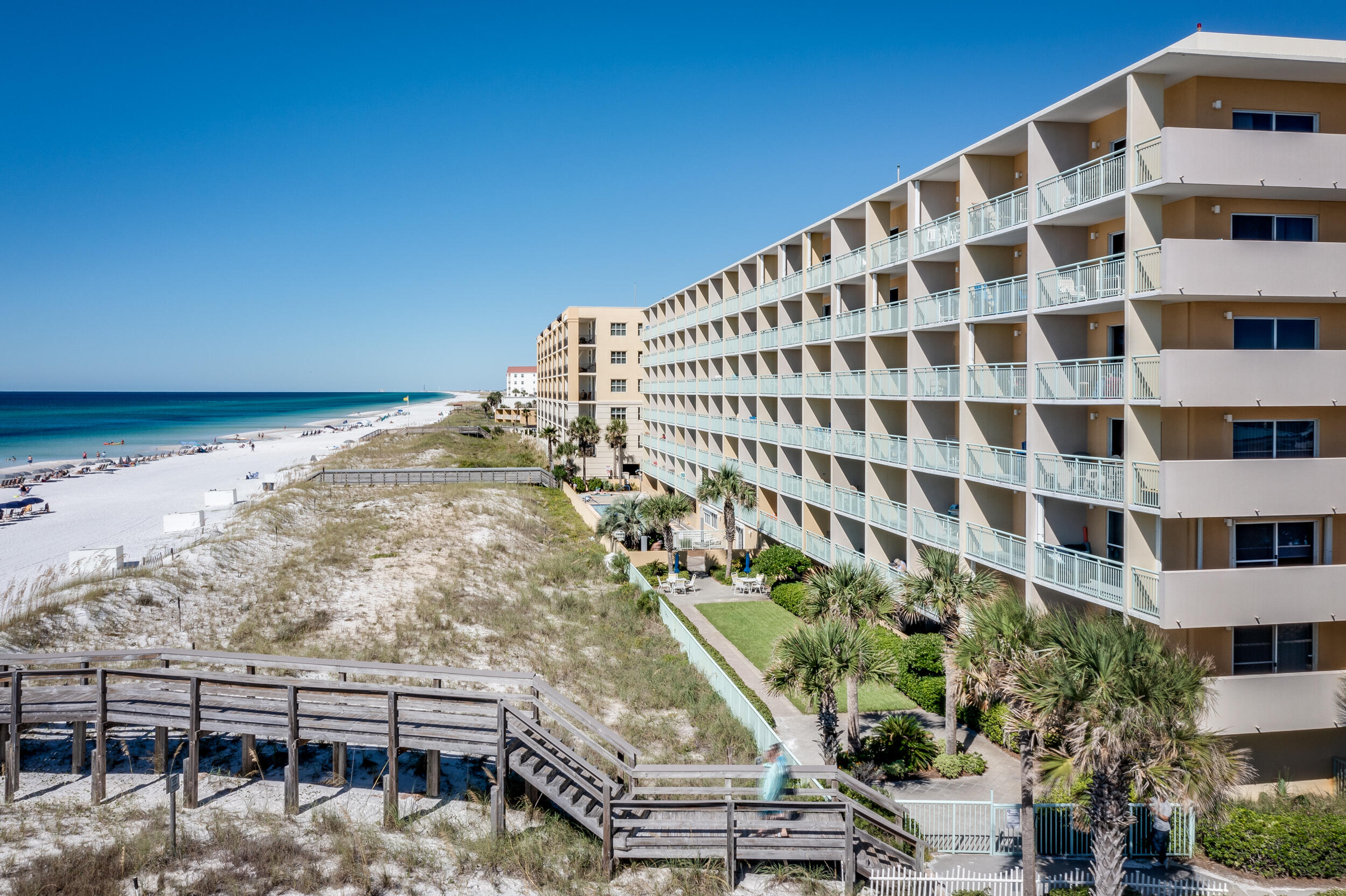 866 Santa Rosa Boulevard, Unit 317 Fort Walton Beach, FL 32548 - Photo 29 of 46 a front view of a building with glass door