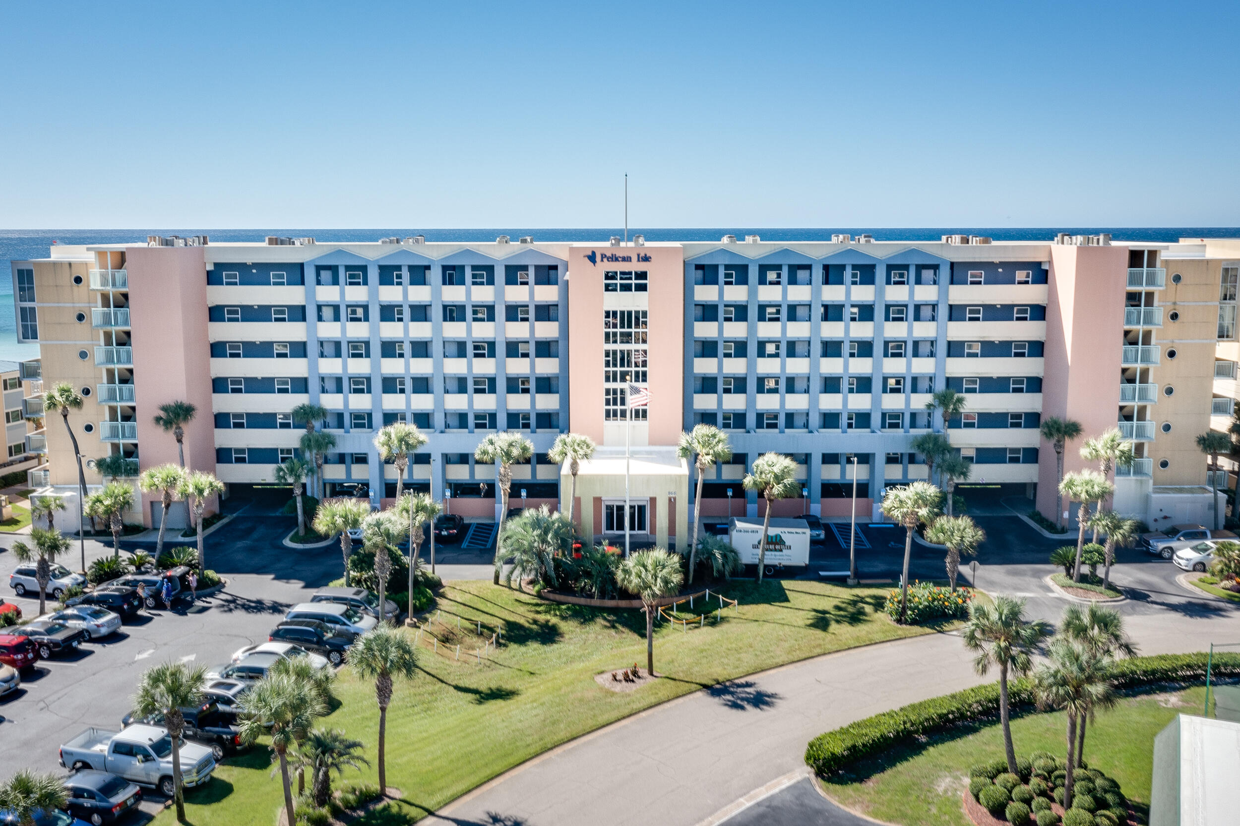 866 Santa Rosa Boulevard, Unit 317 Fort Walton Beach, FL 32548 - Photo 38 of 46 a picture of water building with outdoor seating and plants