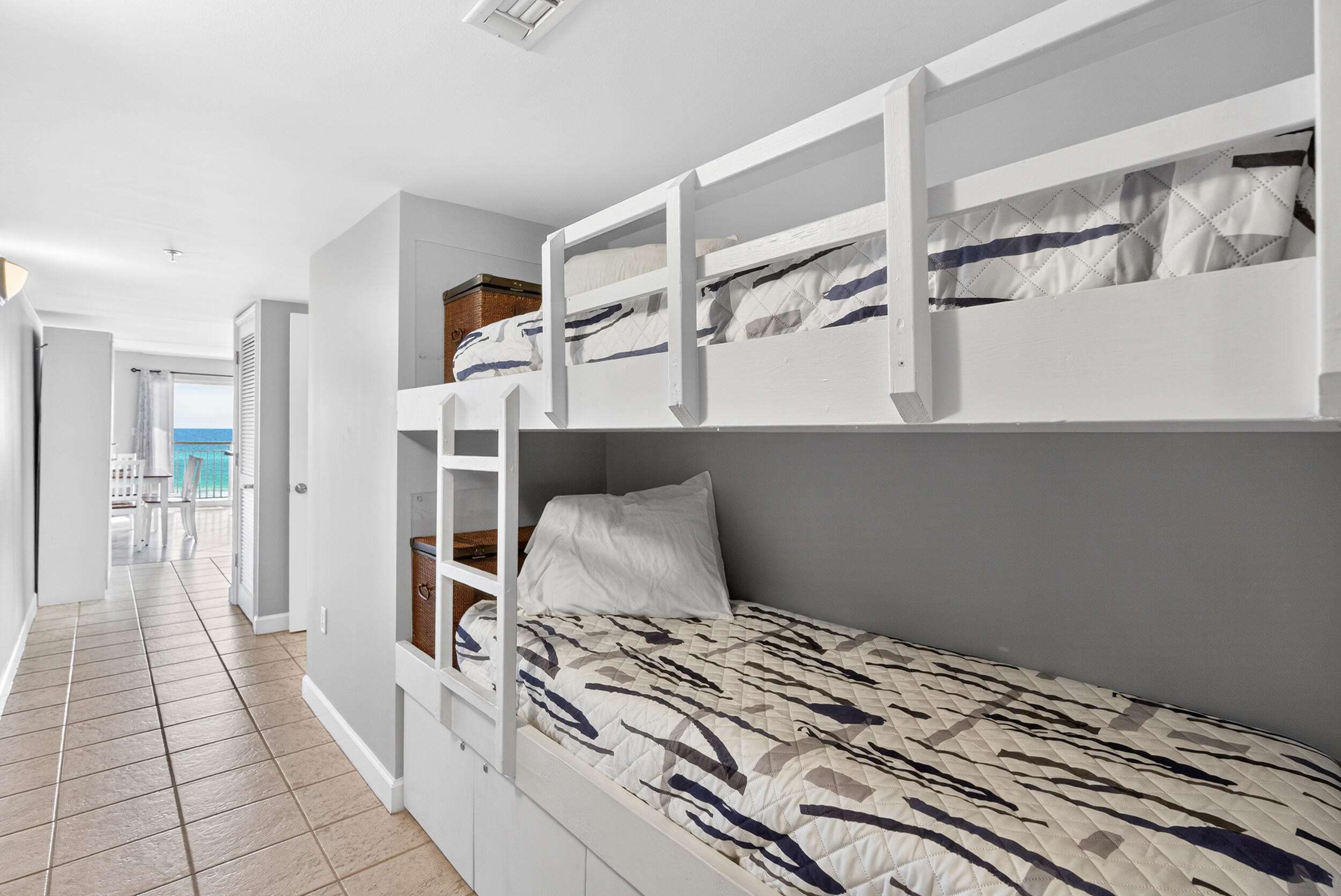 866 Santa Rosa Boulevard, Unit 317 Fort Walton Beach, FL 32548 - Photo 5 of 46 a bedroom with a bed and the view of closet