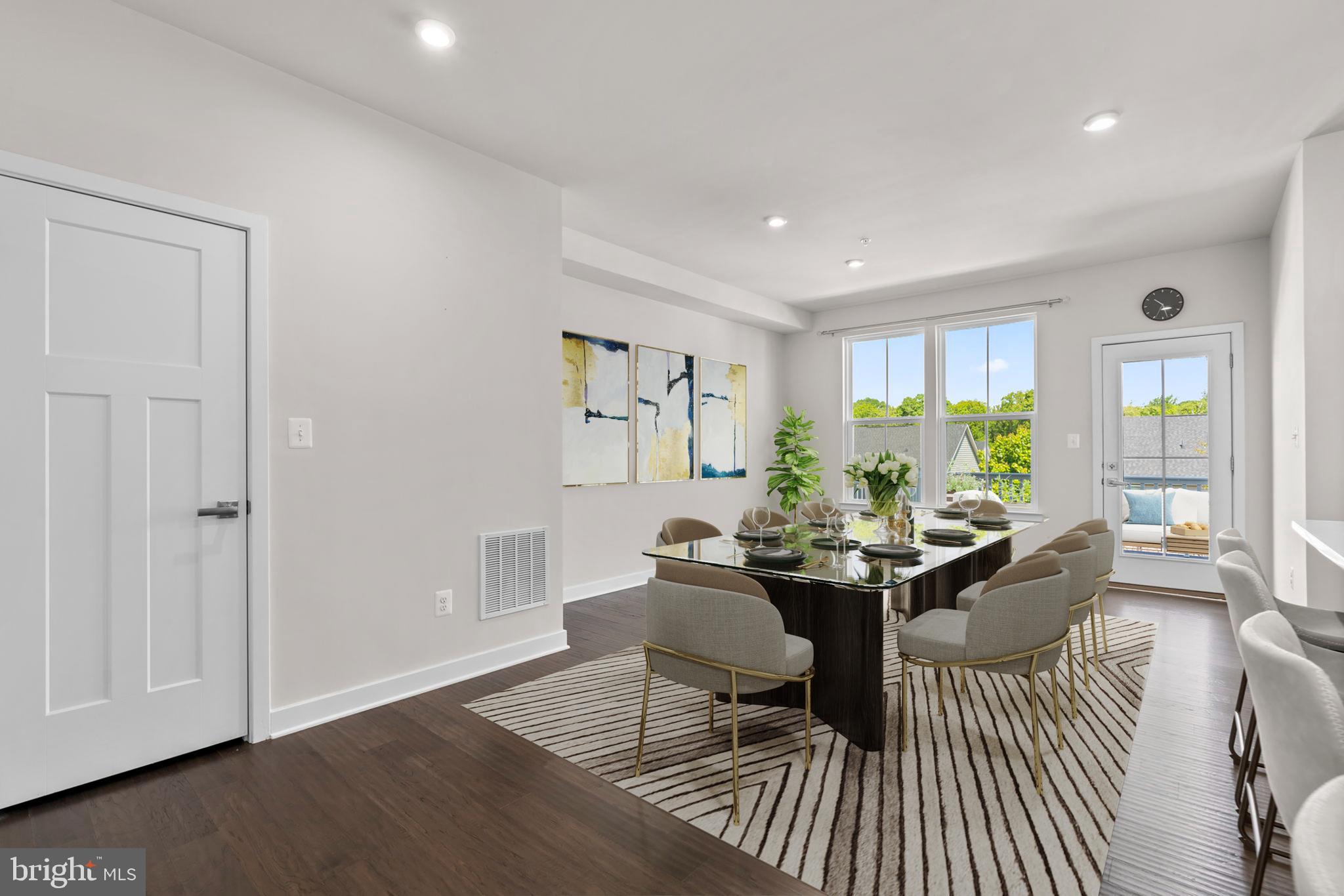 733 Iron Gate Road Bel Air, MD 21014 - Photo 12 of 41 a view of a dining room with furniture window and wooden floor