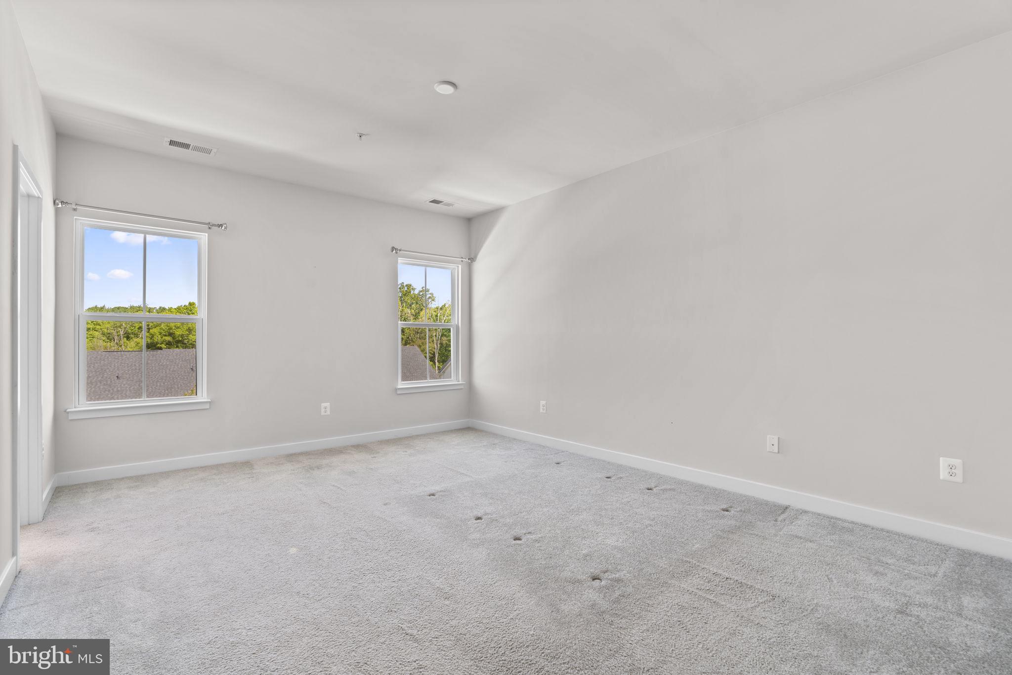 733 Iron Gate Road Bel Air, MD 21014 - Photo 17 of 41 an empty room with windows