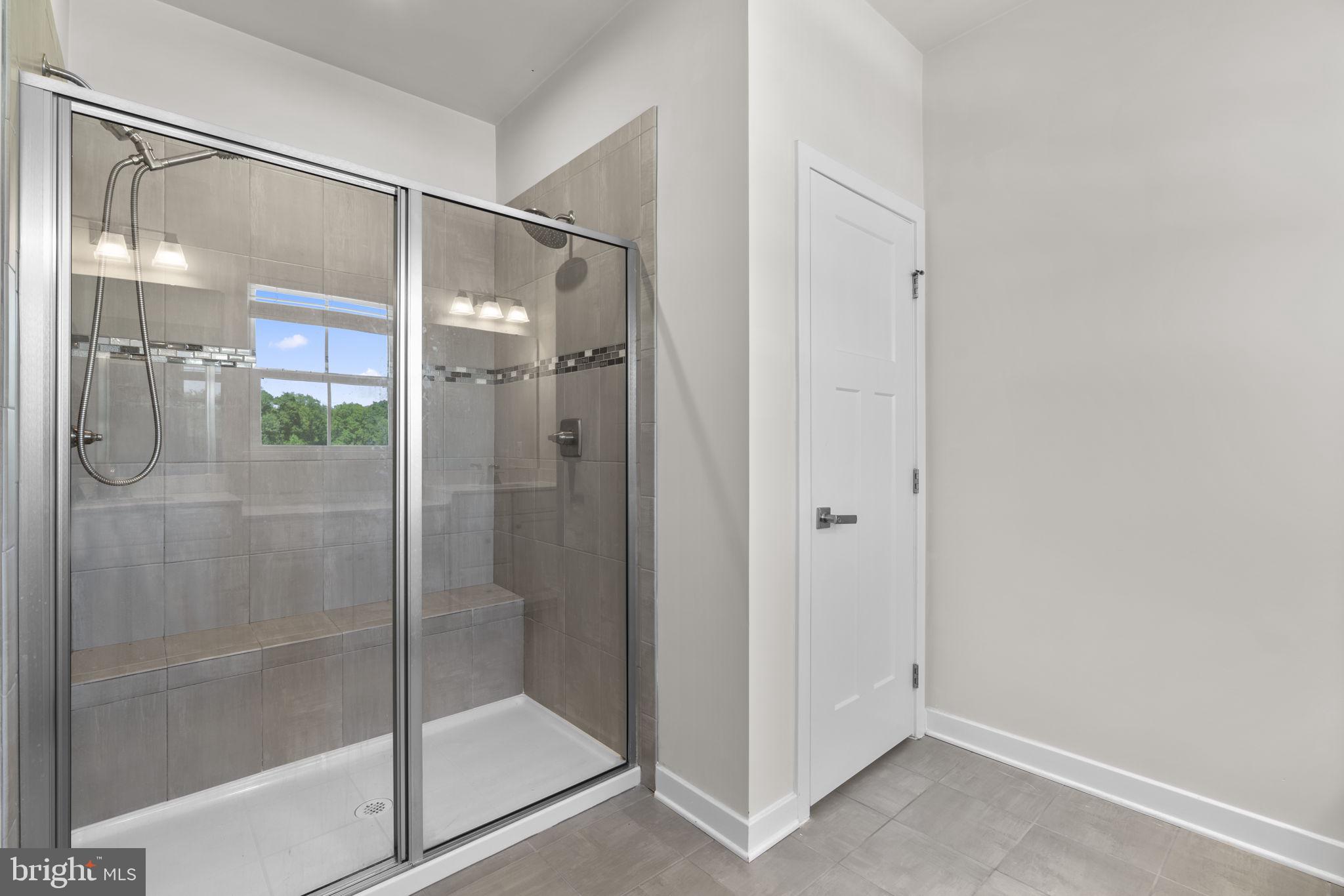 733 Iron Gate Road Bel Air, MD 21014 - Photo 21 of 41 a bathroom with a glass shower door