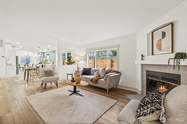 a kitchen with a sink appliances and cabinets
