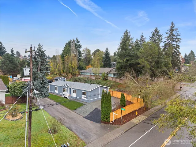 a large body of water with a building in the background