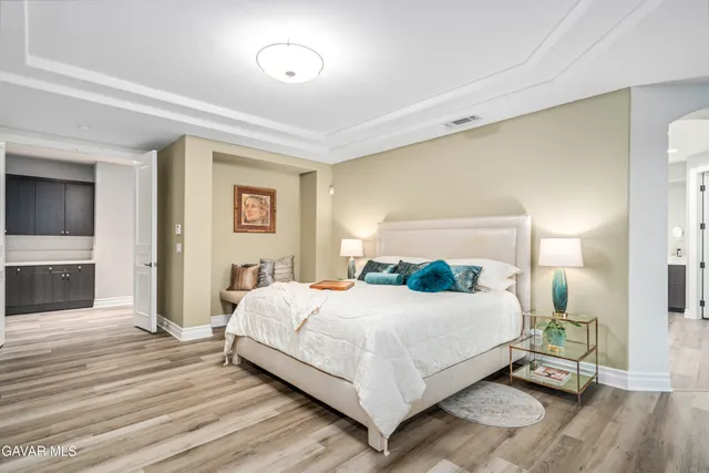 an aerial view of a house with a garden and yard