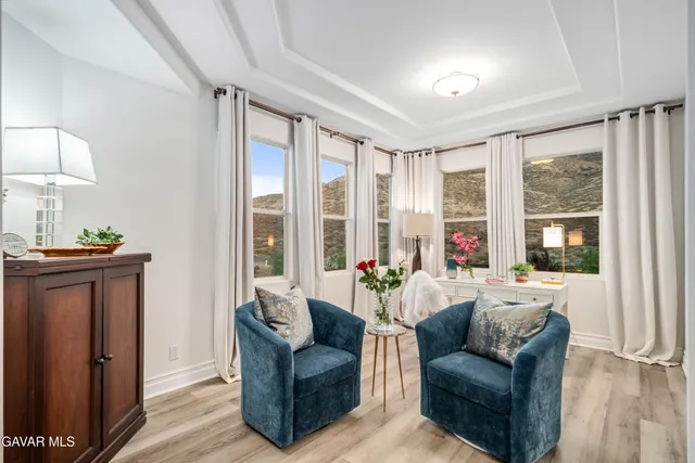 an aerial view of a residential houses with outdoor space