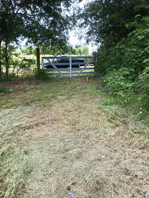 700 Vz County 3418 Road Wills Point, TX 75169 - Photo 3 of 9 a backyard of a house with lots of green space