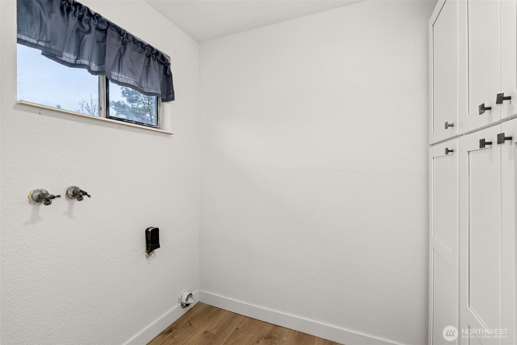 18821 Guava Street Southwest Rochester, WA 98579 - Photo 16 of 28 a view of a room with rack on the wall