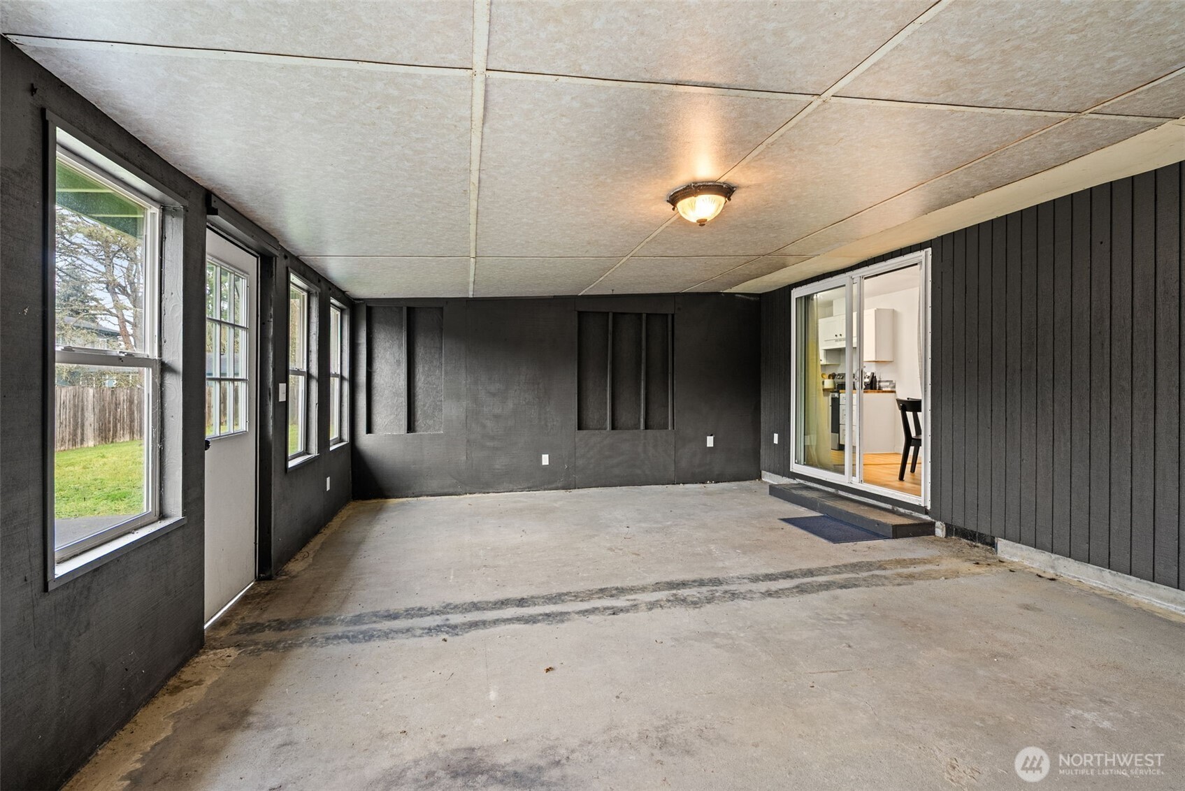 18821 Guava Street Southwest Rochester, WA 98579 - Photo 19 of 28 a view of a hallway with a window