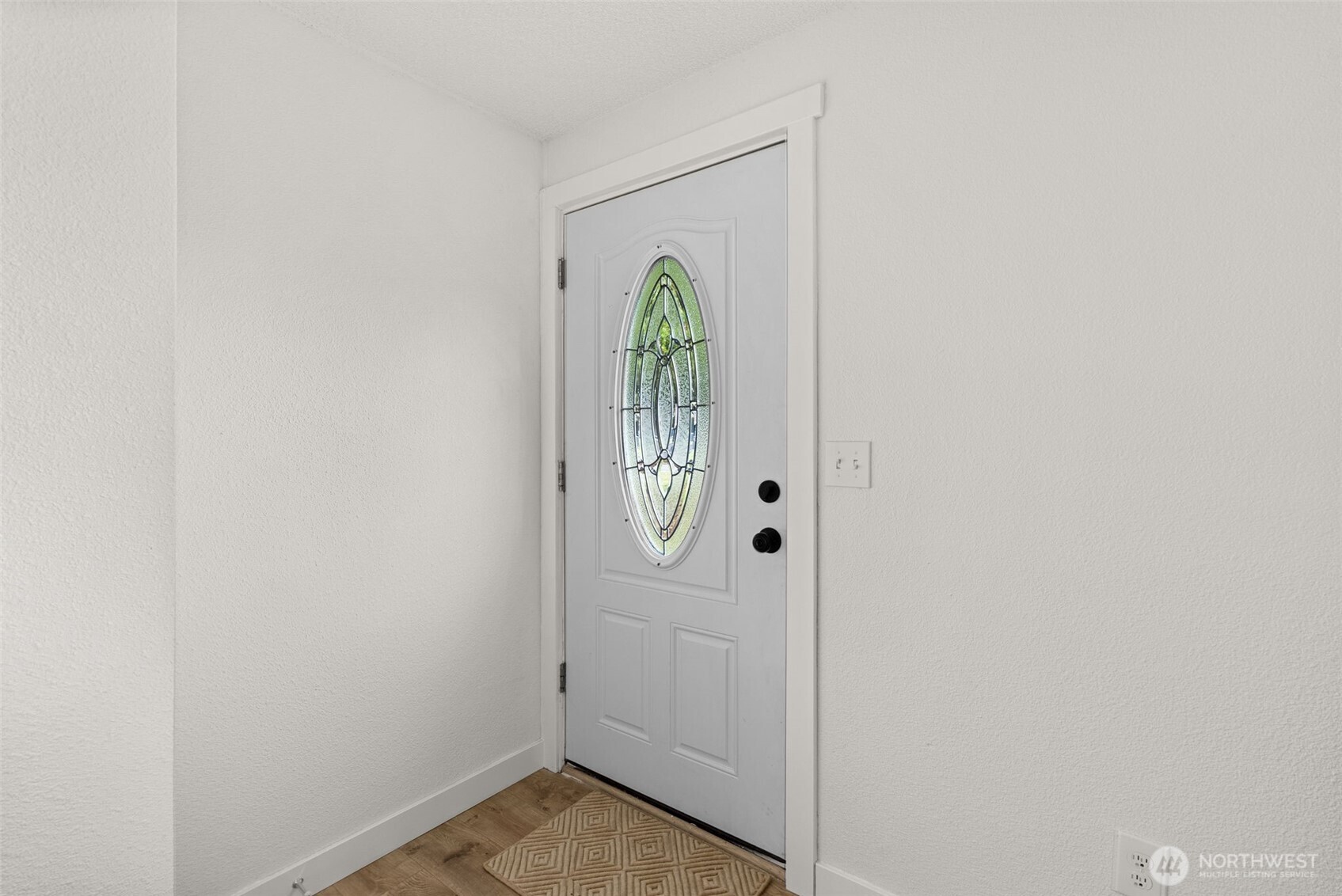 18821 Guava Street Southwest Rochester, WA 98579 - Photo 2 of 28 view of a livingroom with wooden floor