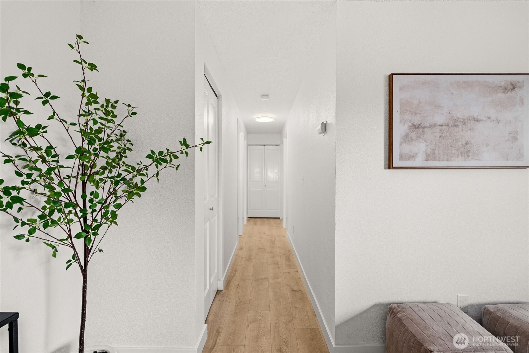 18821 Guava Street Southwest Rochester, WA 98579 - Photo 10 of 28 a view of a hallway with wooden floor and plant