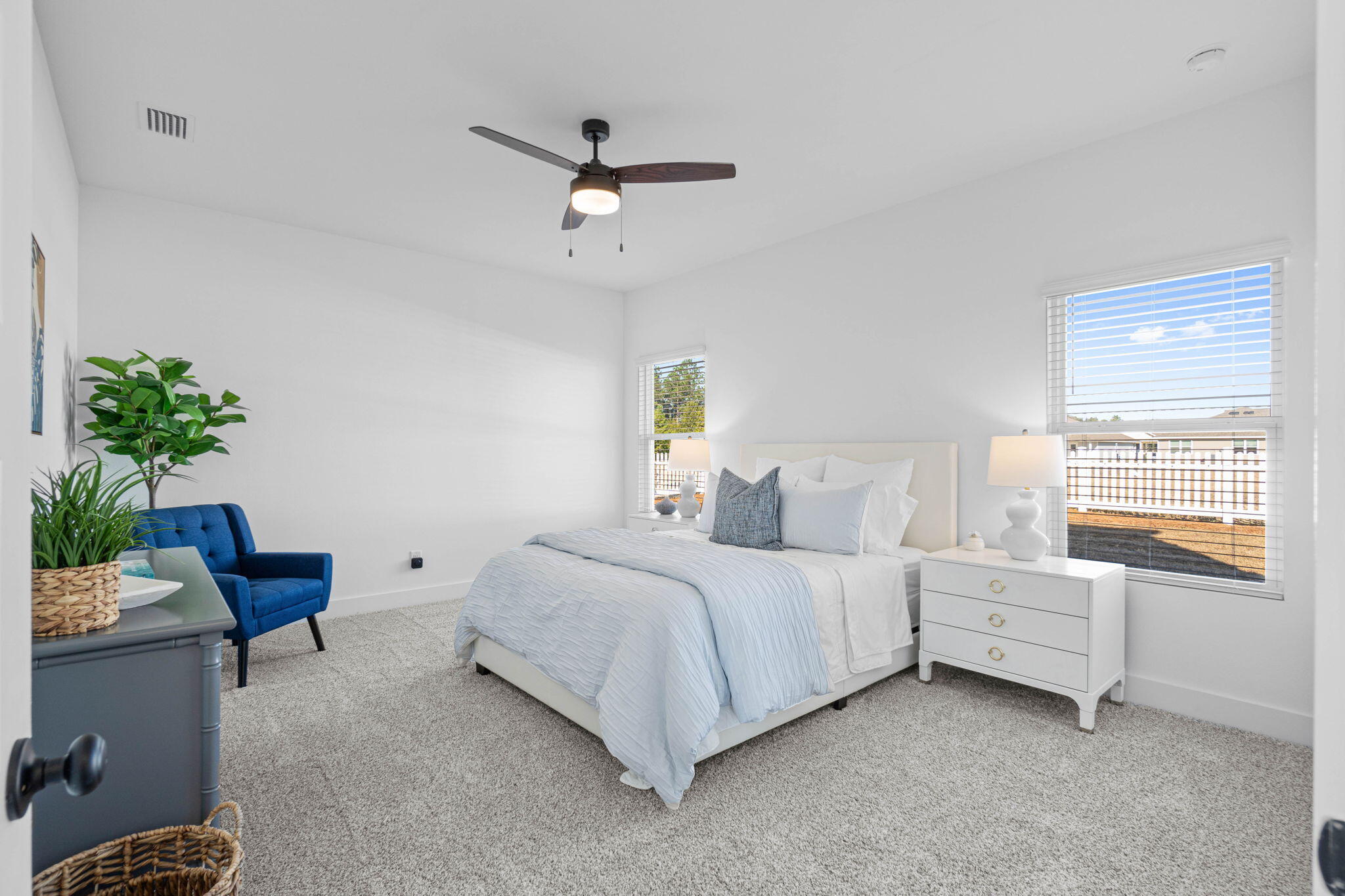 41 Sweetclover Street Freeport, FL 32439 - Photo 12 of 35 a bedroom with a bed furniture and a window