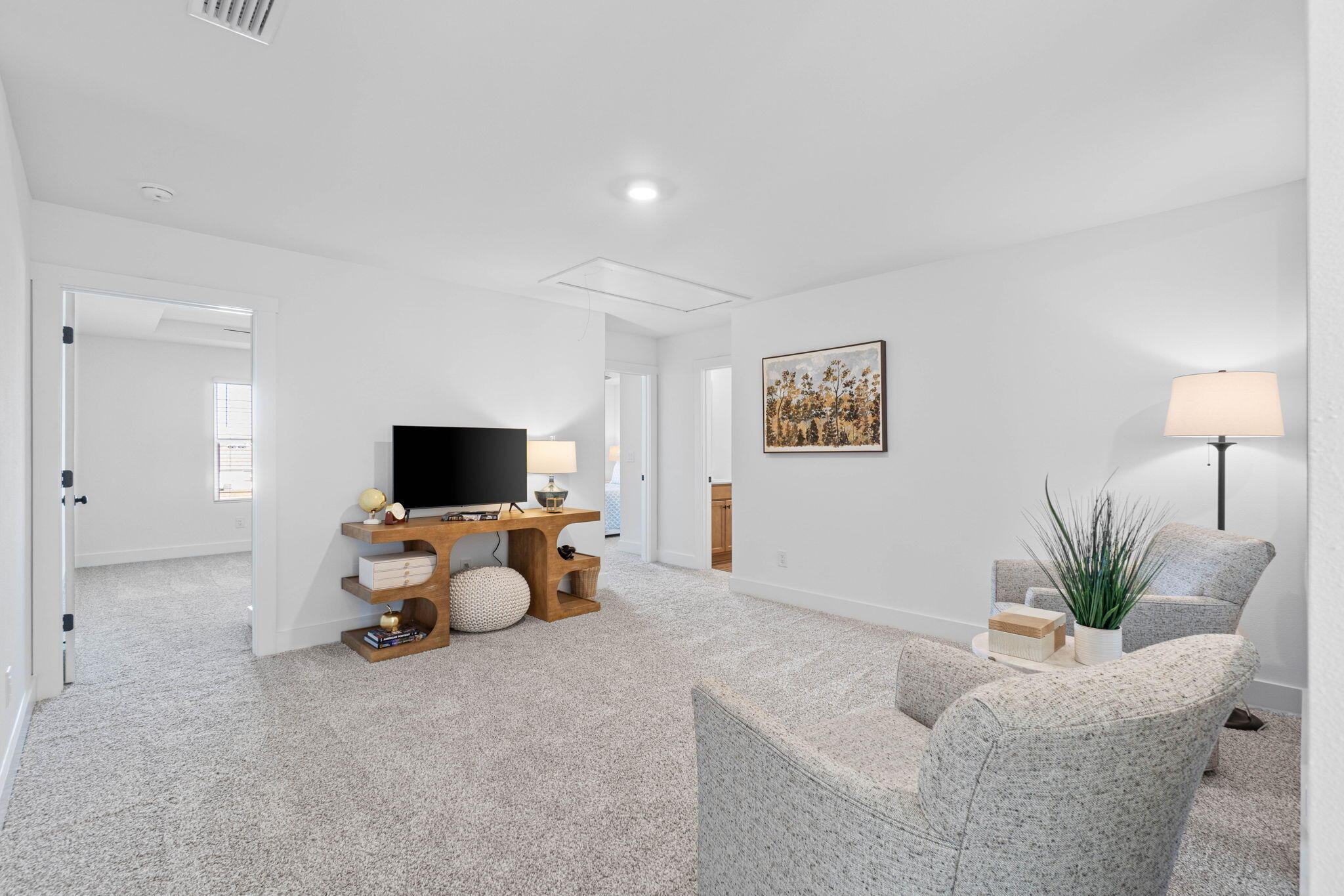41 Sweetclover Street Freeport, FL 32439 - Photo 15 of 35 a living room with furniture and a flat screen tv