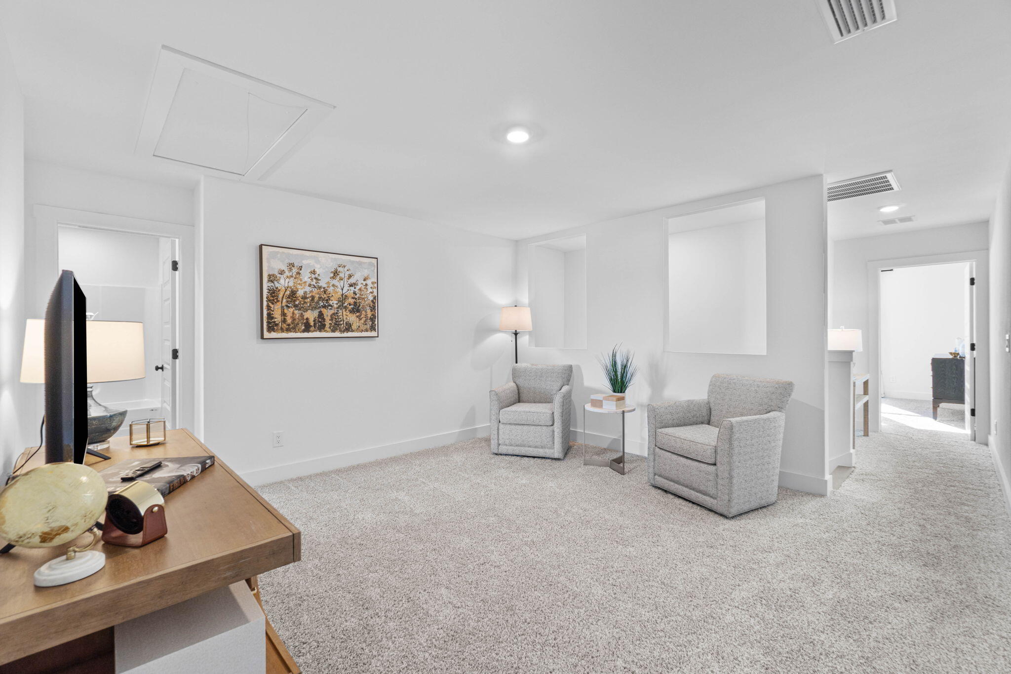 41 Sweetclover Street Freeport, FL 32439 - Photo 16 of 35 a living room with furniture and a lamp