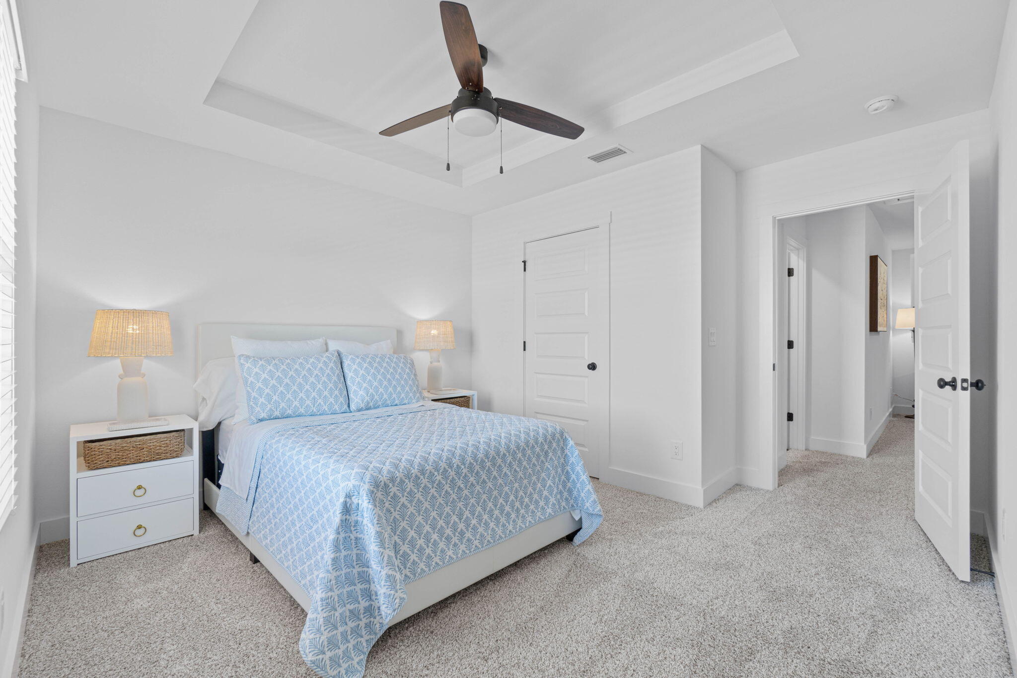 41 Sweetclover Street Freeport, FL 32439 - Photo 20 of 35 a bedroom with a bed and a lamp