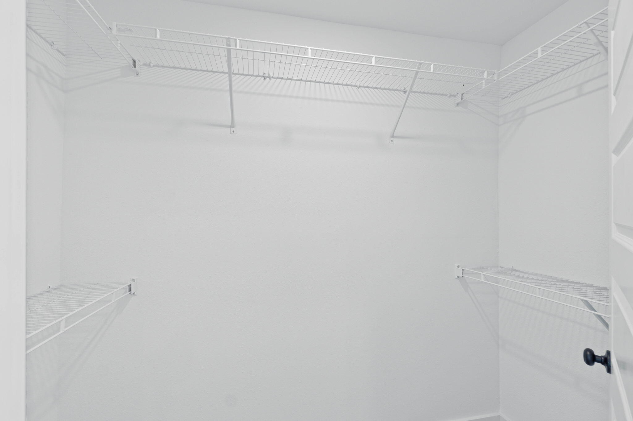 41 Sweetclover Street Freeport, FL 32439 - Photo 29 of 35 a view of a room with racks on the wall