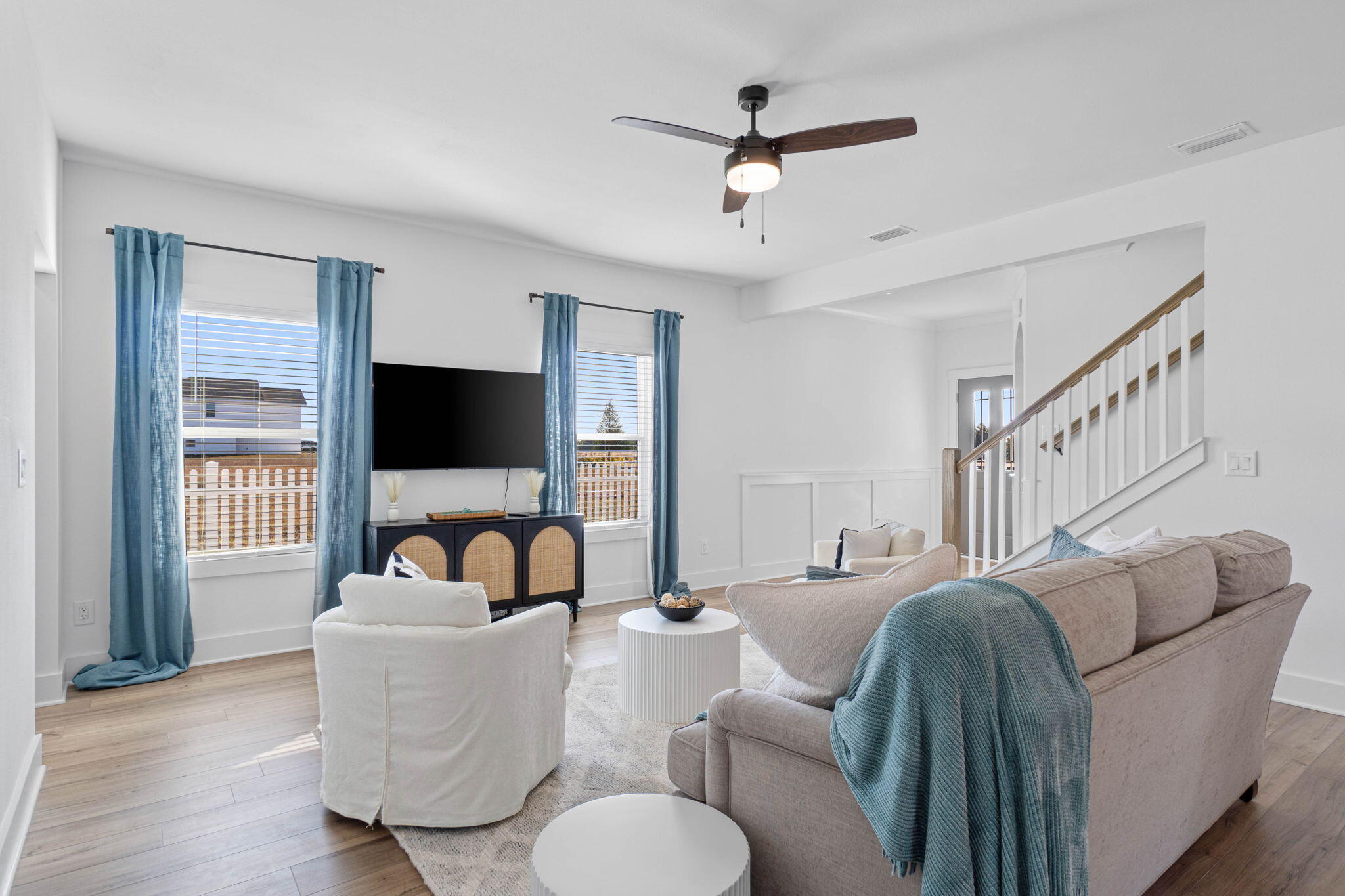 41 Sweetclover Street Freeport, FL 32439 - Photo 5 of 35 a living room with furniture and a flat screen tv