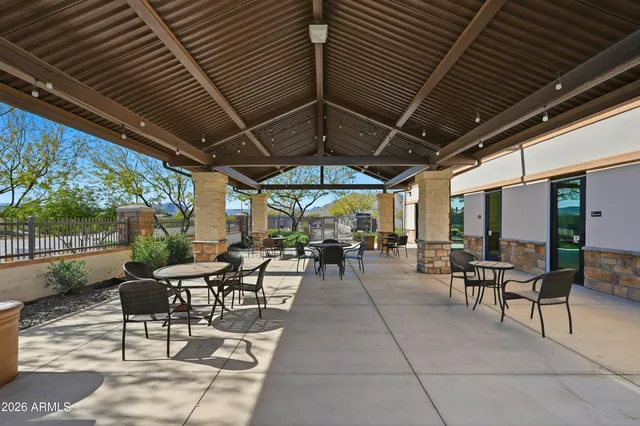 a bathroom with a sink a mirror and shower