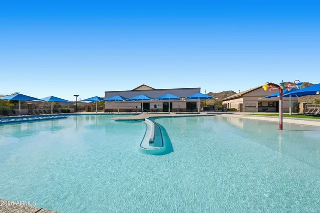 a outdoor space with lots of tables and chairs