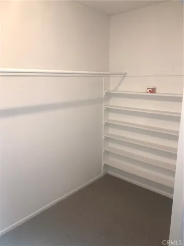 a view of small space with racks on the wall