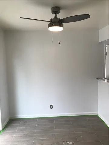a kitchen with stainless steel appliances white cabinets and a sink
