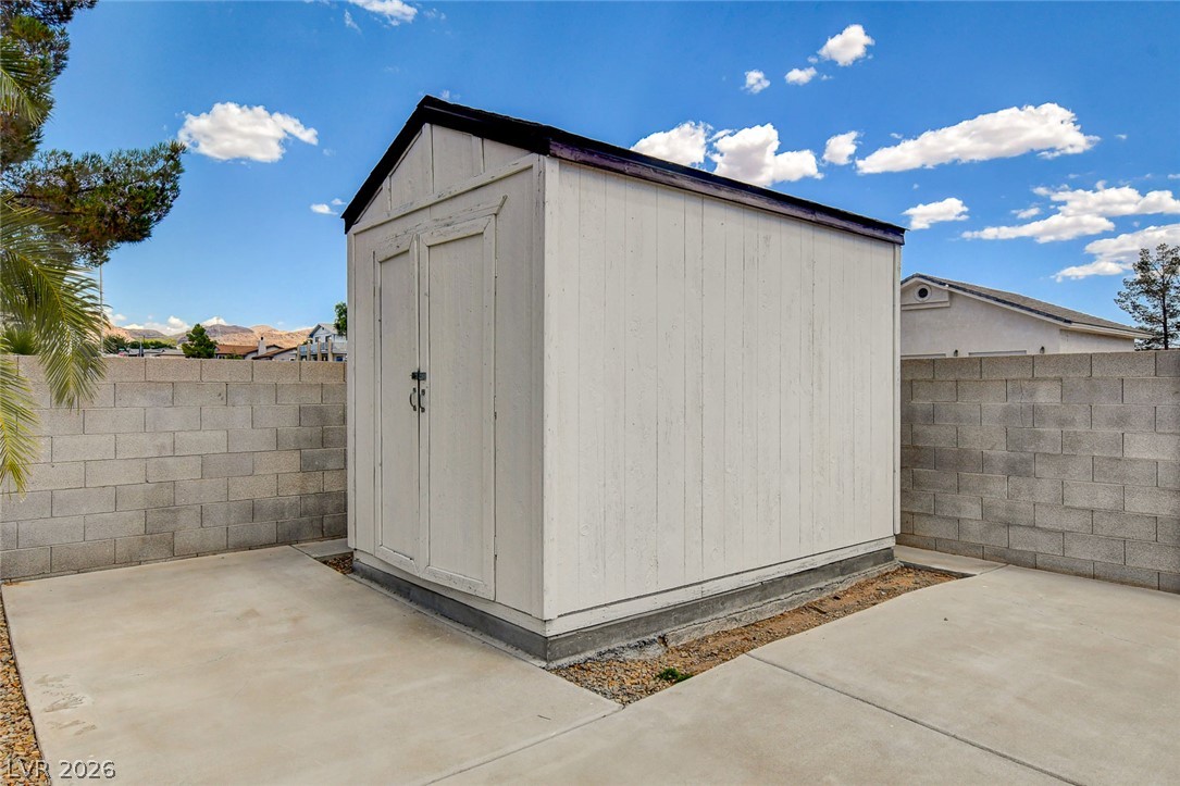 1810 Pinto Road Henderson, NV 89002 - Photo 52 of 53 A freestanding utility shed offers additional storage space in the rear yard.