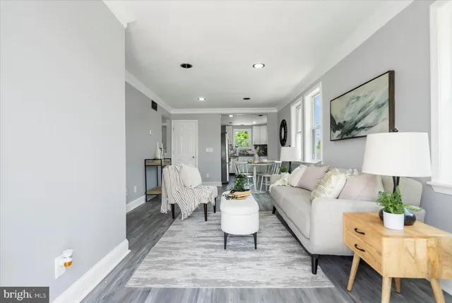 a living room with furniture and a couch