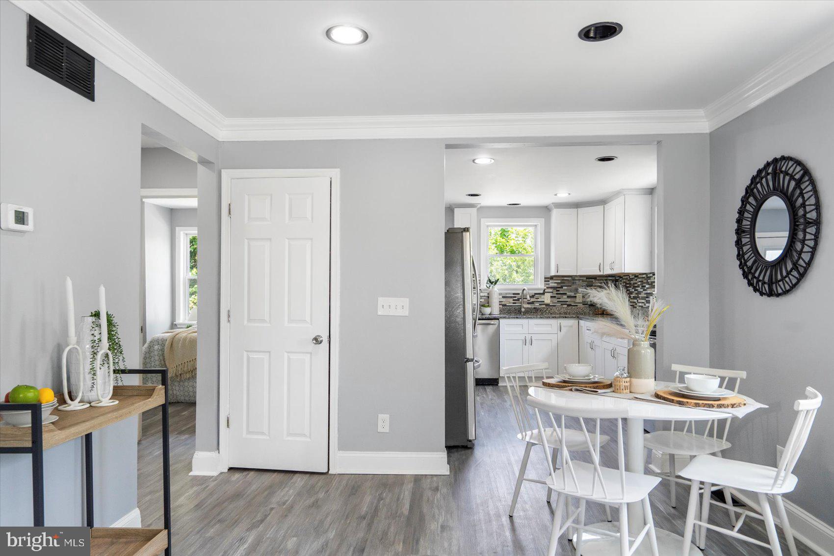 6628 Hartwait Street Baltimore, MD 21224 - Photo 5 of 31 a view of a kitchen and dining room