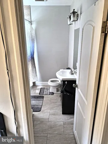 a bathroom with a shower and a bathtub