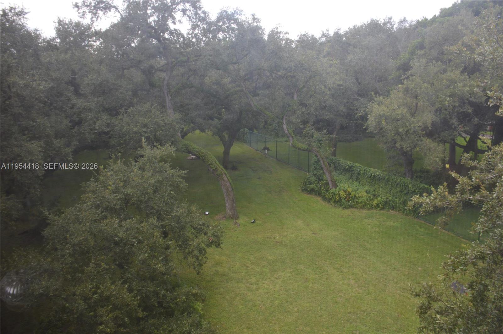 461 Ives Dairy Road, Unit 4042 Miami, FL 33179 - Photo 11 of 20 a view of a small yard