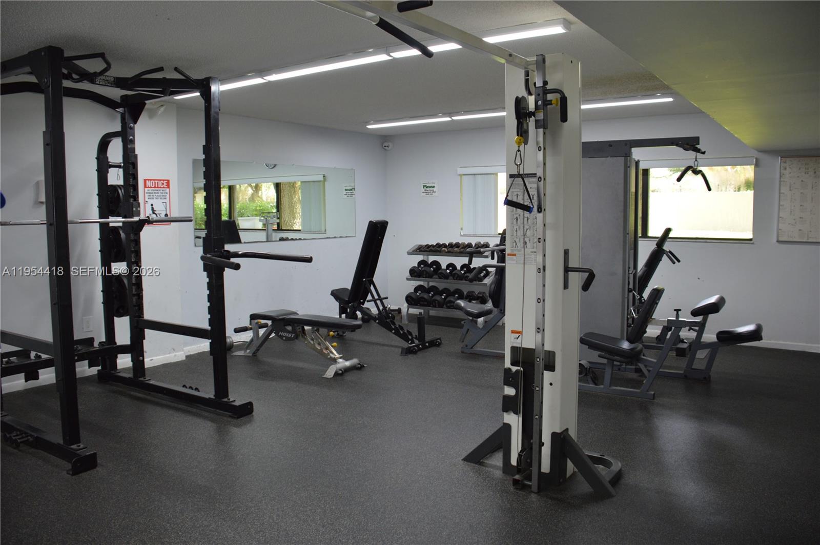461 Ives Dairy Road, Unit 4042 Miami, FL 33179 - Photo 17 of 20 a view of a room with gym equipment