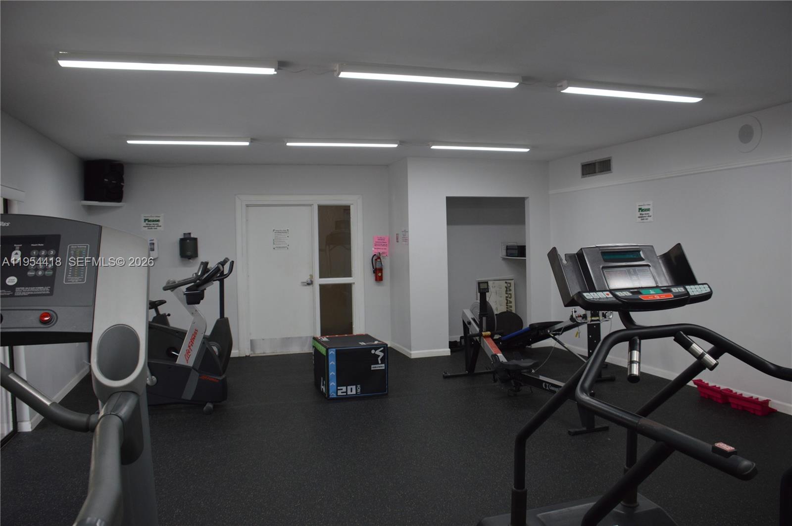 461 Ives Dairy Road, Unit 4042 Miami, FL 33179 - Photo 18 of 20 a view of a room with gym equipment