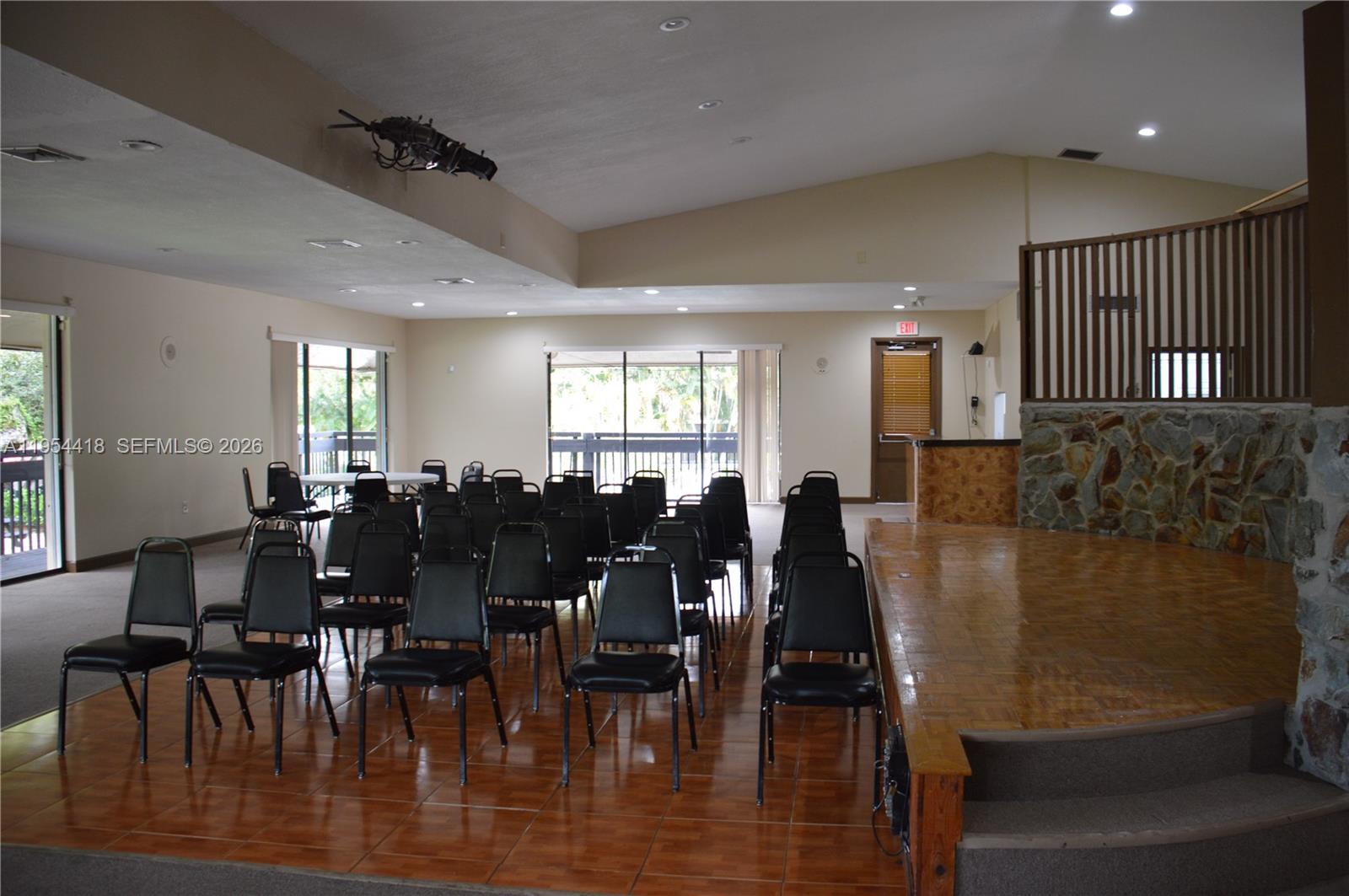 461 Ives Dairy Road, Unit 4042 Miami, FL 33179 - Photo 20 of 20 a large room with lots of furniture