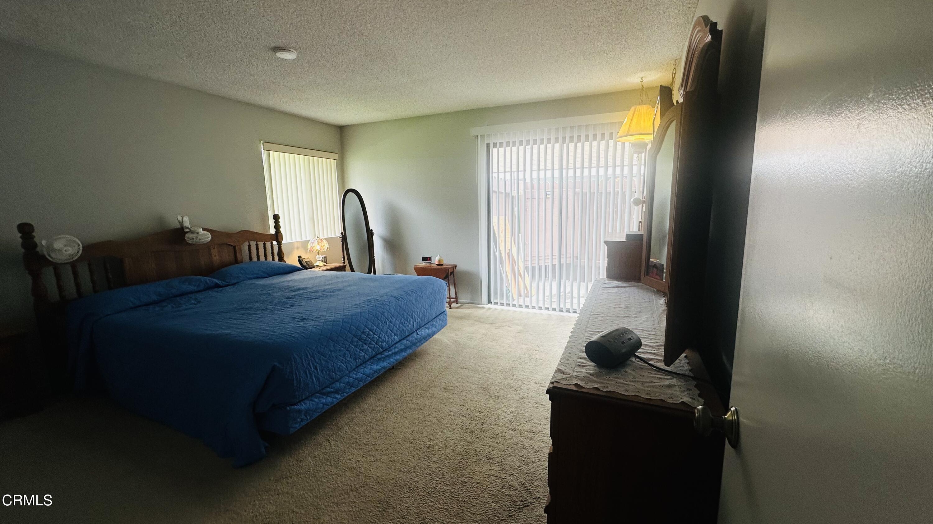 5150 Longfellow Way Oxnard, CA 93033 - Photo 24 of 51 a living room with furniture and a window