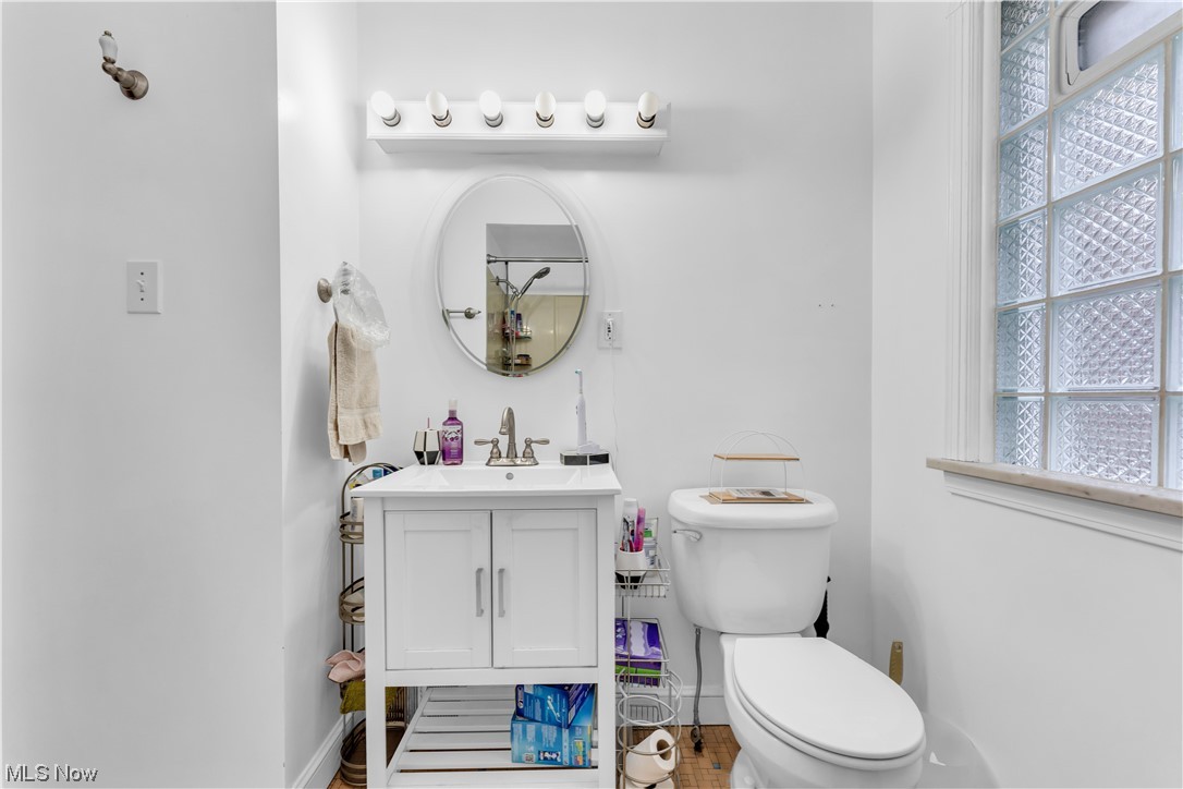 13566 Cedar Road Cleveland, OH 44118 - Photo 22 of 49 Bathroom with vanity and toilet