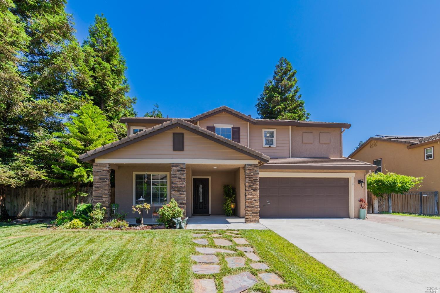 1630 Sequoia Way Dixon, CA 95620 - Photo 1 of 1 a front view of a house with a yard and potted plants