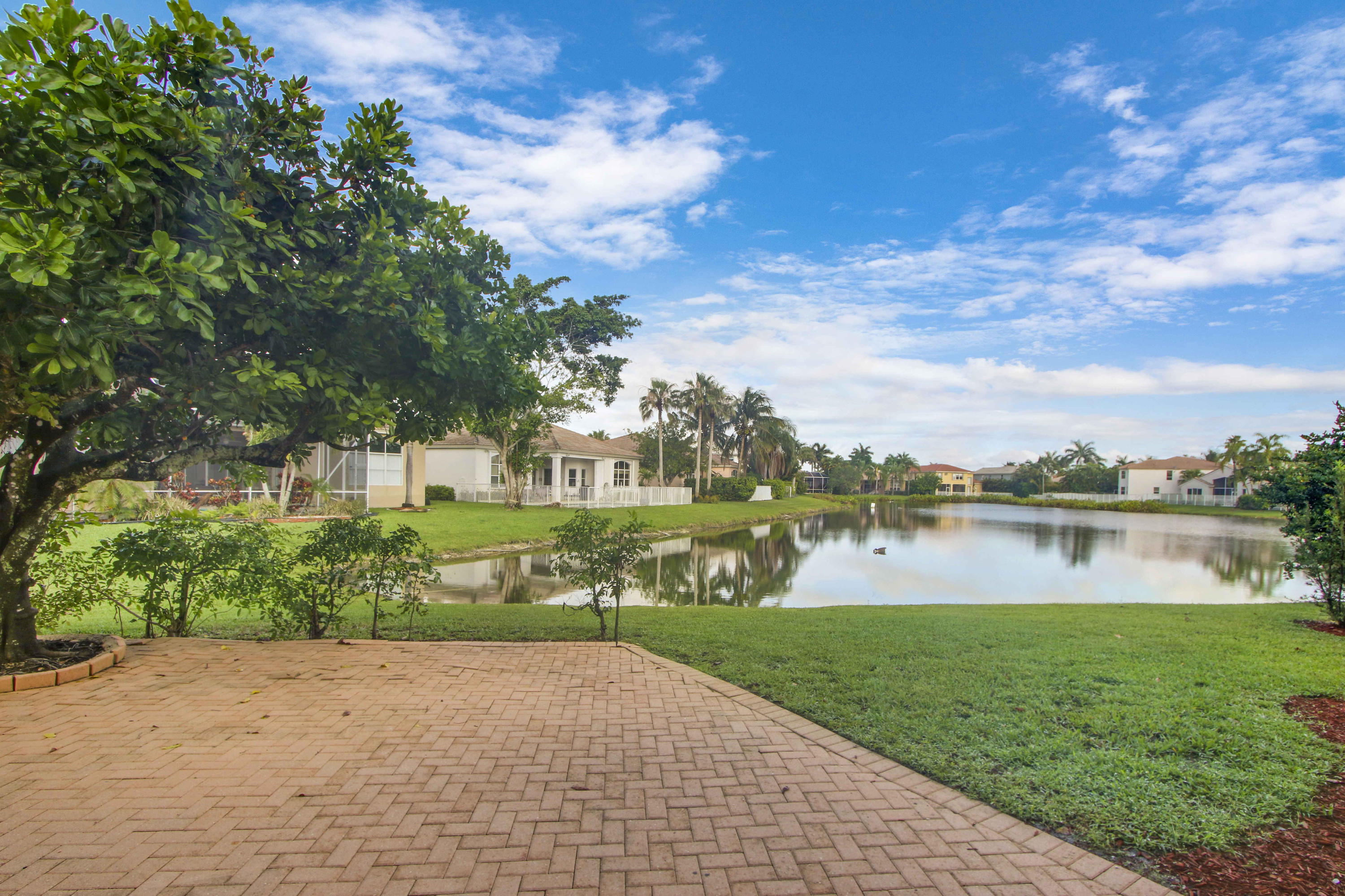 18705 Sea Turtle Lane Boca Raton, FL 33498 - Photo 18 of 27 Patio Overlooking Lake