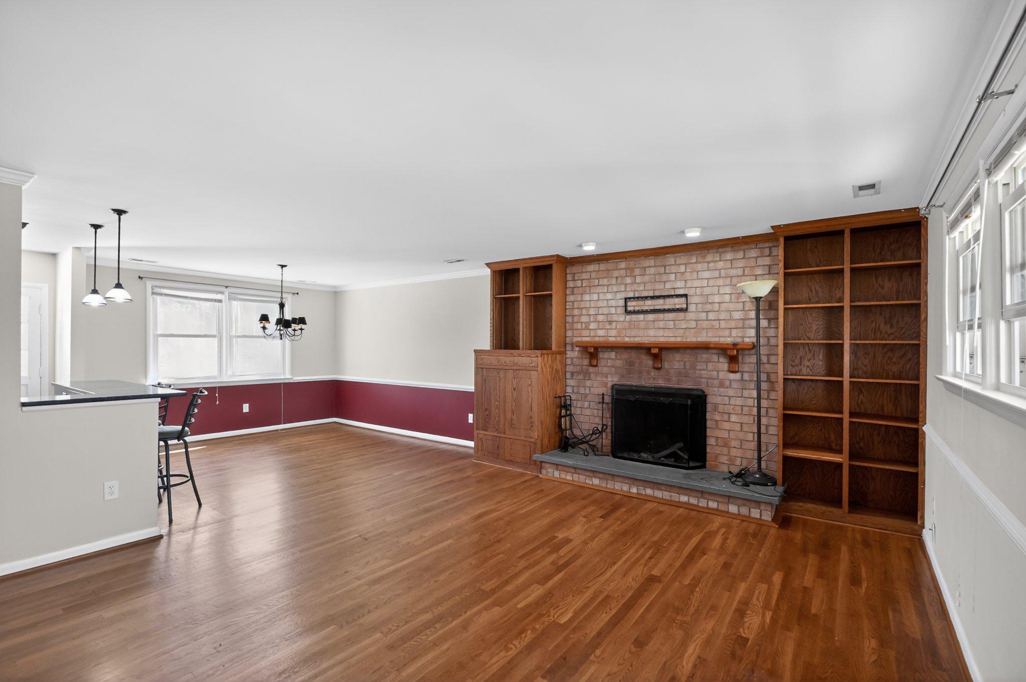 7391 Baldwin Ridge Road Warrenton, VA 20187 - Photo 7 of 31 Living room with built in cabinets and fireplace