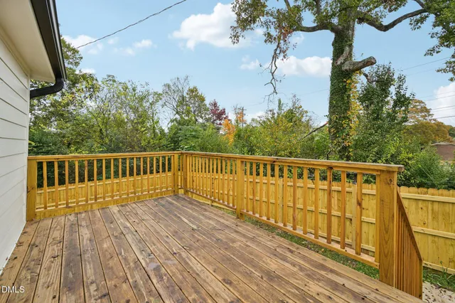a bathroom with a toilet a sink and shower