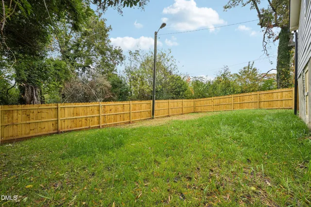 a view of balcony with wooden floor