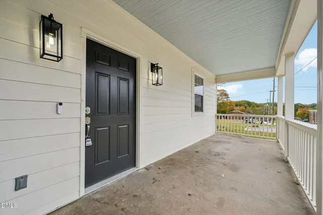 a picture of a bench in front of a window